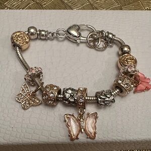 Elegant Silver and Gold Butterfly Charm Bracelet